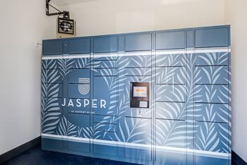 a blue wall with a jasper logo on it